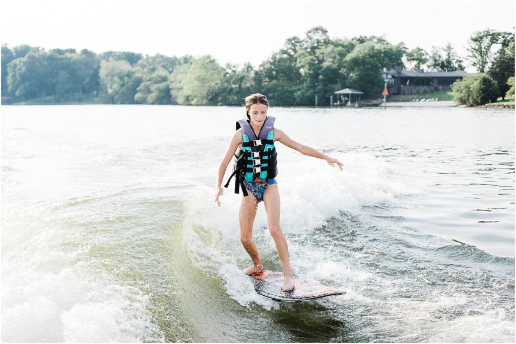 Smith mountain lake Virginia family photographer. SML Lake vacation by renee ash photography Wakesurfing behind the Cobalt R5Surf