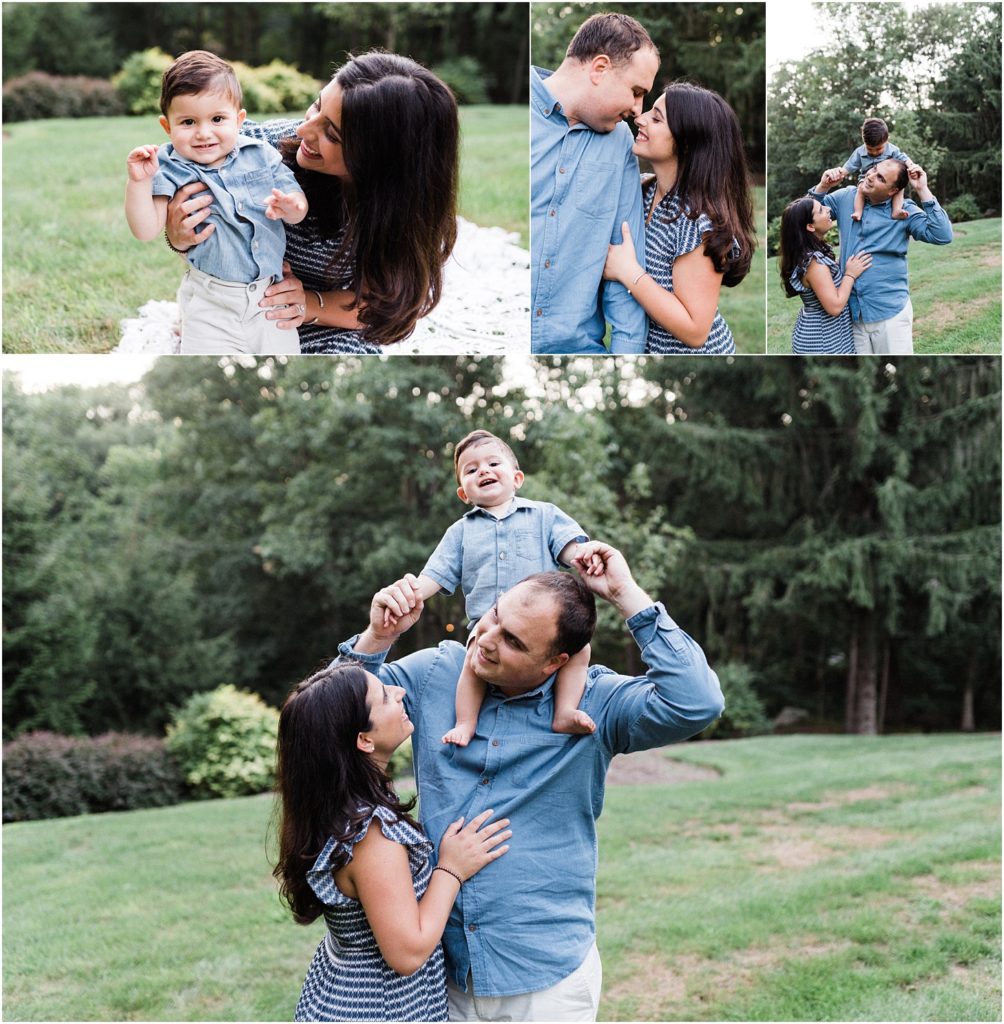 Family first birthday boy session outside at home. No cake smash. Family of three dressed in blue and white wardrobe during the summer. Photos by Renee Ash Photography Sussex County NJ photographer. 