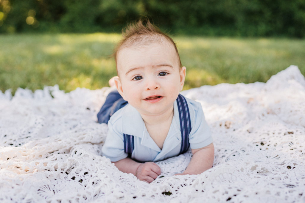 Sussex County NJ family Photographer. How to take monthly pictures of baby. 5 month old baby boy doing tummy time by Renee Ash Photography New Jersey Family Photographer 