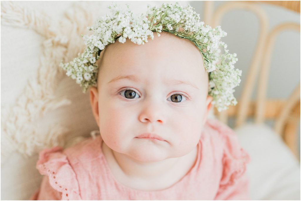 boho spring photo session. Baby in a pink dress with a floral crown. baltic Born white lace dress. 9 month baby pictures. 