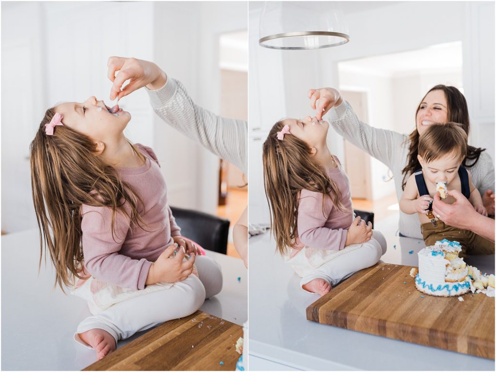 cake smash photo session at home in New Jersey with a family of four in their beautiful white and grey kitchen. Sitting on the kitchen counter top eating cake. 
NJ Family Photographers Renee Ash Photography 