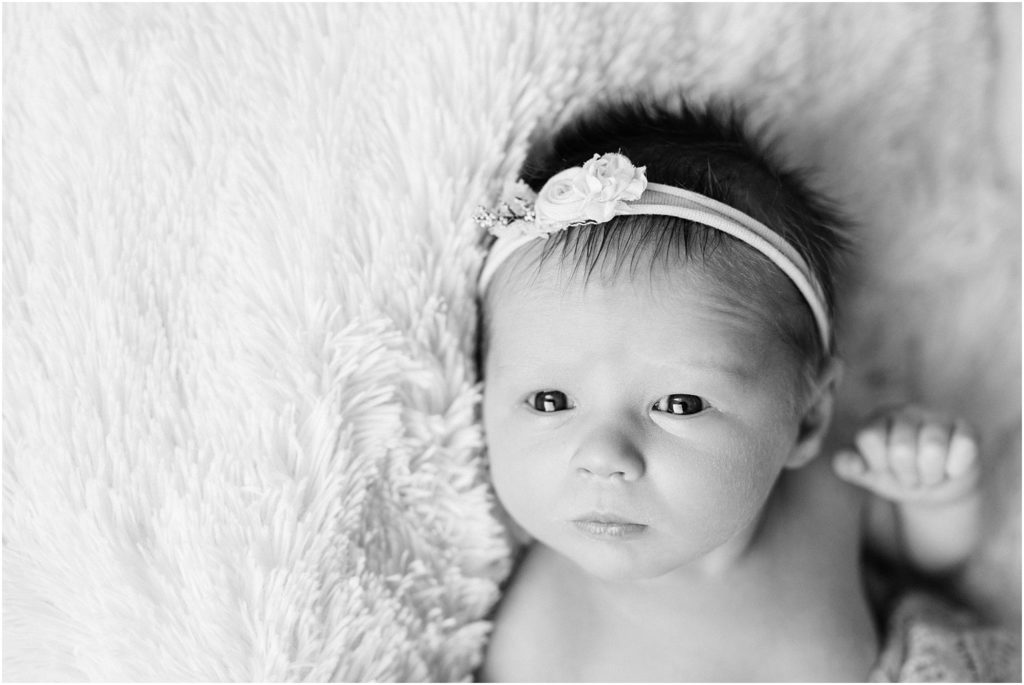 black and white, awake newborn baby girl. Renee Ash Photography NJ Newborn photographers