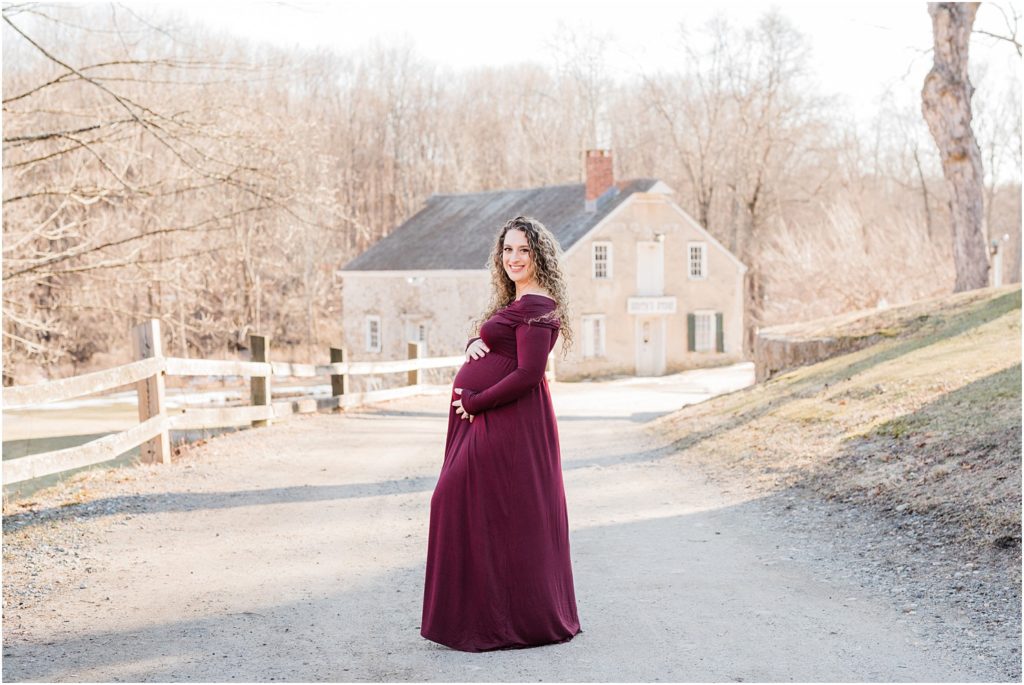 Burgundy maternity gown for maternity pictures at Allamuchy state park. Renee Ash Photography NJ Maternity photographer