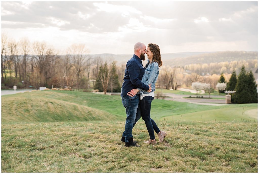 casual engagement photo outfit inspiration. denim jacket and jeans at Crystal Springs Resort in Sussex County NJ by Renee Ash Photography