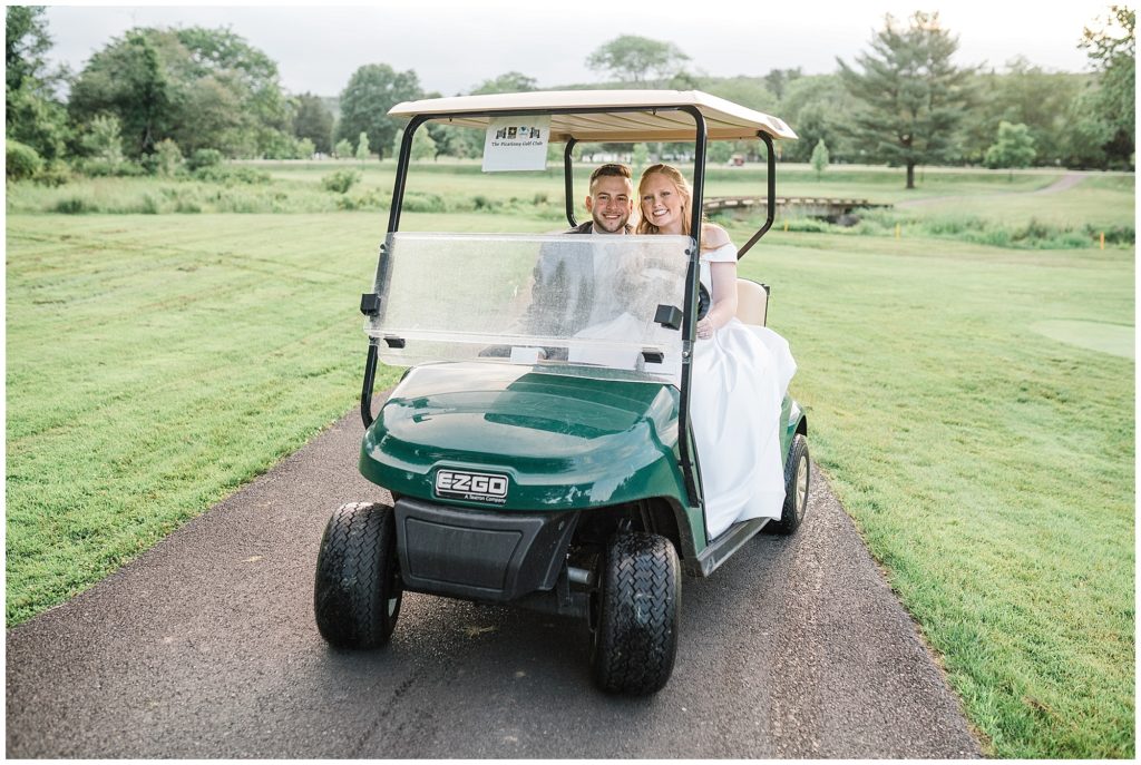Outdoor bride and groom portraits on their wedding day on a golf cart at the Club at Picatinny in dover New Jersey. Photo by Renee Ash Photography 