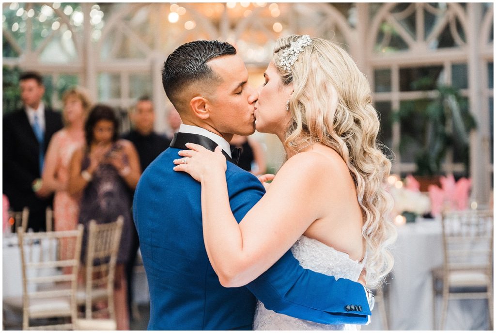 bride and groom sharing their first dance in the Grand Conservatory at the Brownstone summer wedding.  Renee Ash Photography