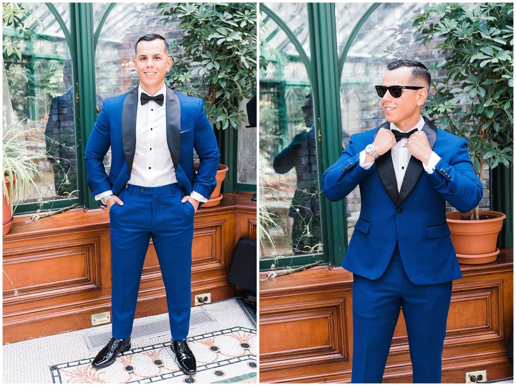 Groom in a blue and black suit getting ready the morning of his wedding at the Brownstone.  Renee Ash Photography