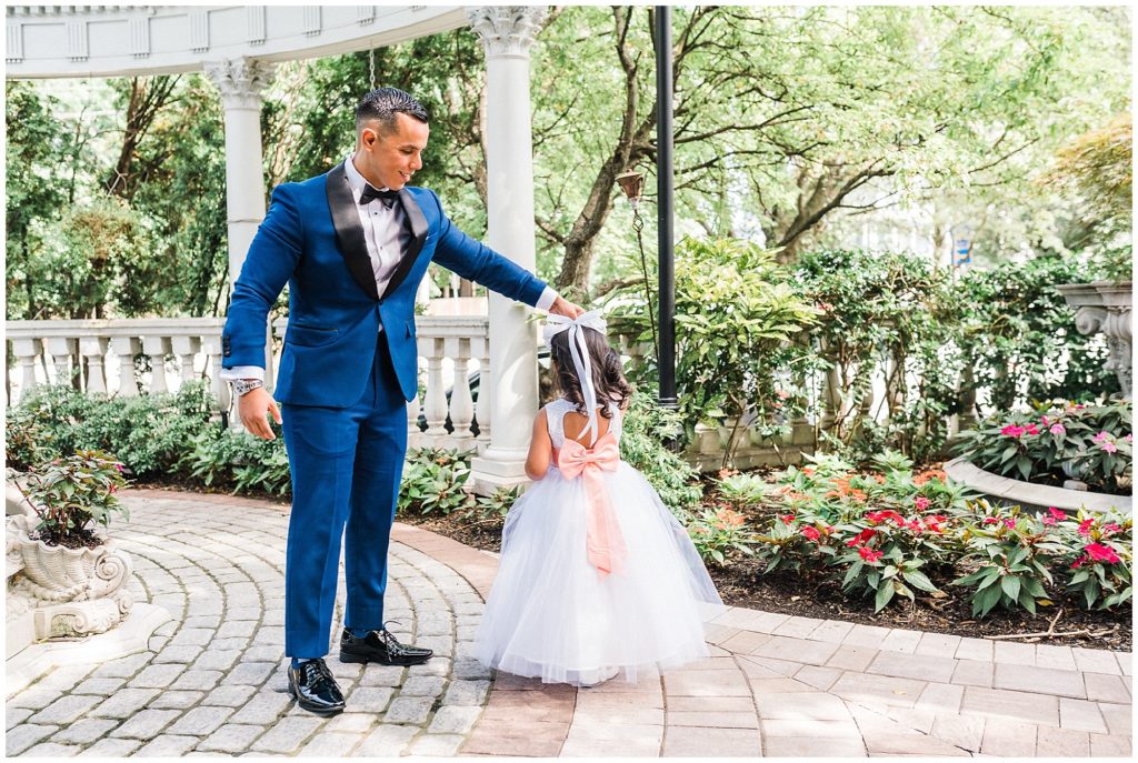 daddy daughter first look photos in the courtyard at the Brownstone.  Renee Ash Photography