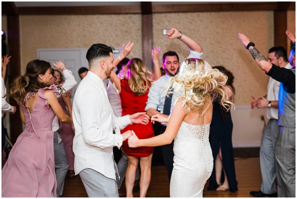 Bride and Groom dancing during their reception at the Club at Picatinny. Renee Ash Photography