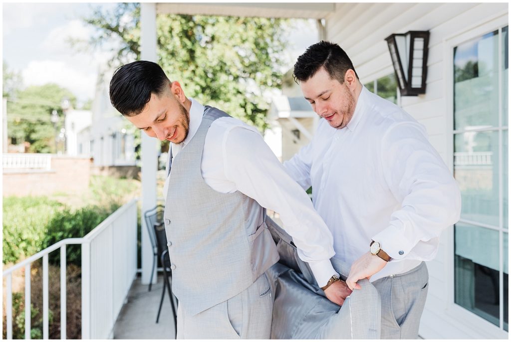Groom getting ready with his best man at The Club at Picatinny.  New Jersey wedding venue. Renee Ash Photography