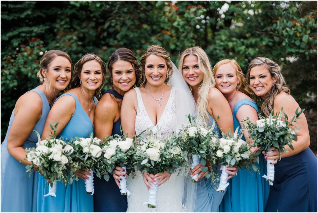 Blue bridesmaids dresses with white and greenery bouquets Sussex County NJ wedding photographer