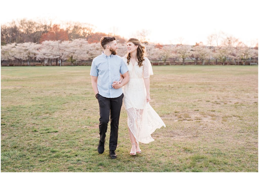engagement photos in the cherry blossoms with Renee Ash Photography