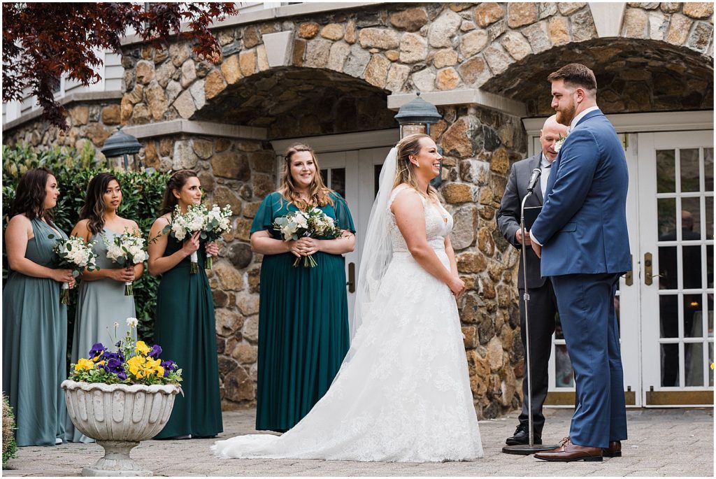  courtyard ceremony space of The Olde Mill Inn Wedding Venue in Northern NJ. by Renee Ash Photography 