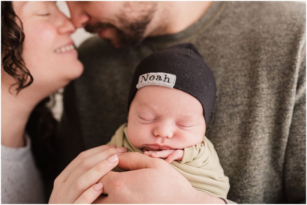 Family pictures with baby boy. Black baby hat with his name. Newborn cap. Renee Ash Photography. 