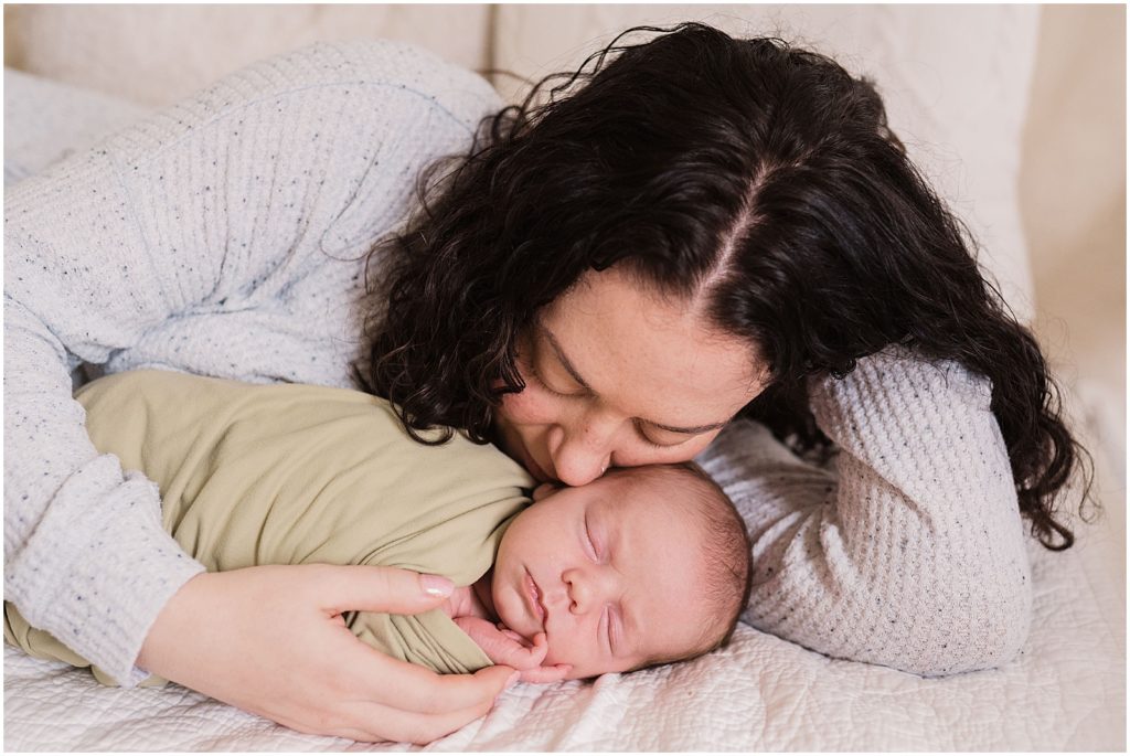 Mom holding baby boy in grays and greens. Newborn baby pictures Vernon NJ Renee Ash Photography