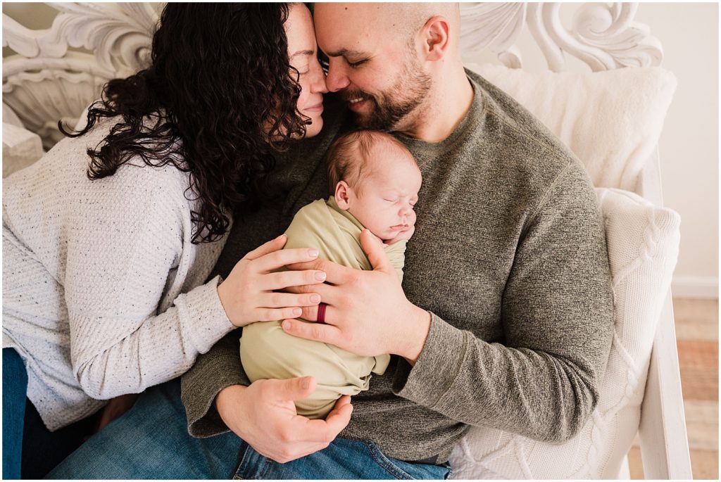 romantic, casual and natural Family pictures with baby boy wrapped in sage green.  Renee Ash Photography. 