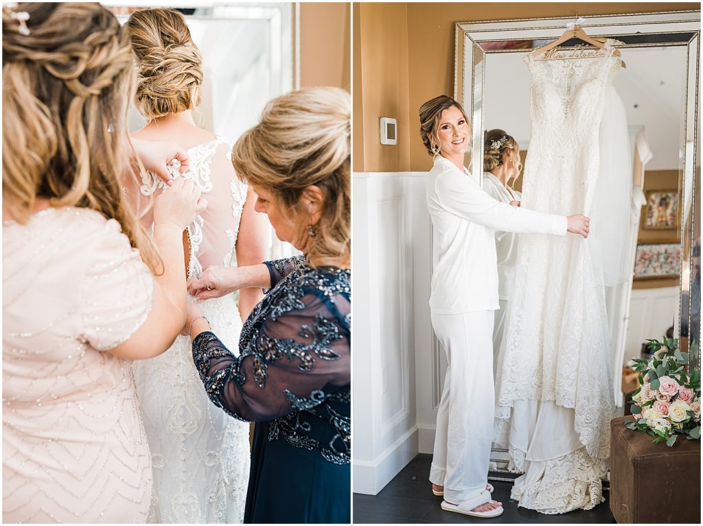 Mother and sister helping the bride get into her wedding dress on her wedding day Bridal Cottage at The Coach House at the Ryland Inn Wedding