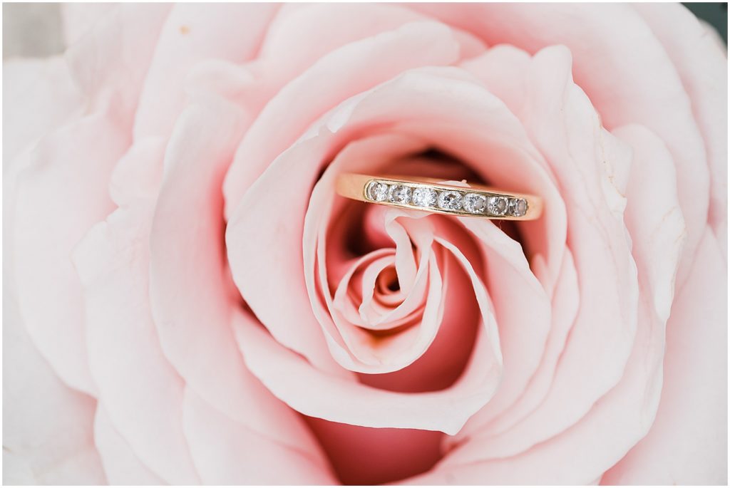 Grandmother's antique gold ring on a pink rose. Bride's something old on her wedding day. The Ryland Inn. 