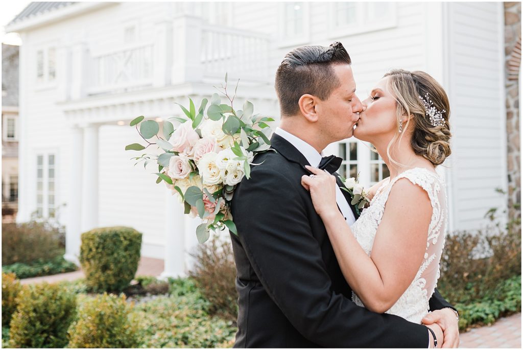 Bride and Groom portraits in front of The Coach House at the Ryland Inn Wedding, Whitehouse Station New Jersey. Renee Ash Photography 