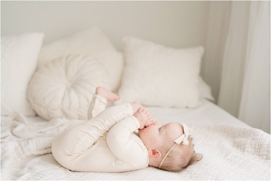 nine month old baby milestone photoshoot. The Shoppes at Lafayette photo studio. 
