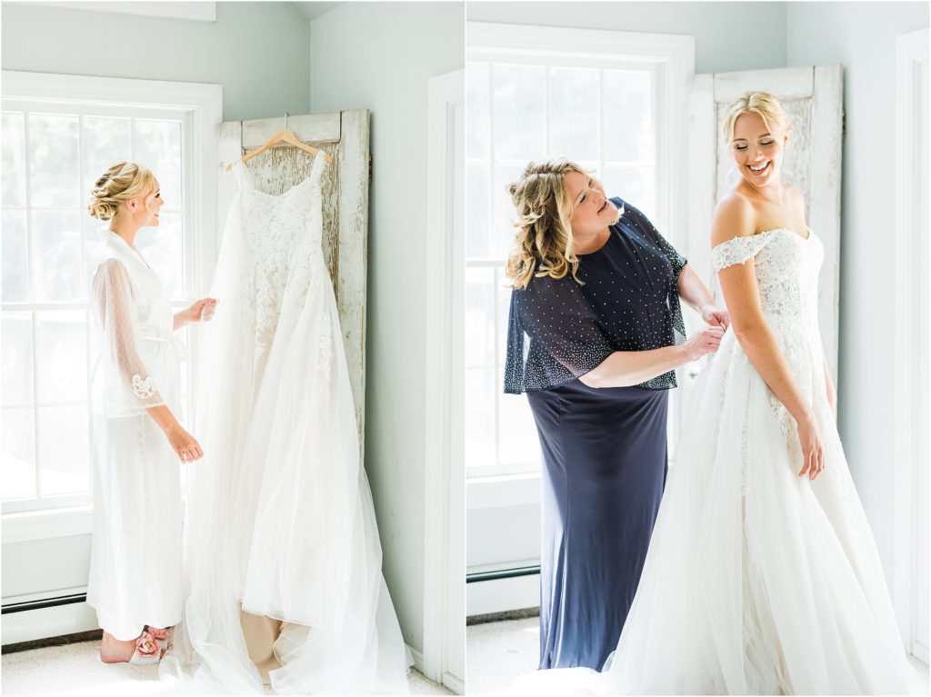 bride getting into her david's bridal A-line gown with her mother in a navy mother of the bride dress helping her. 