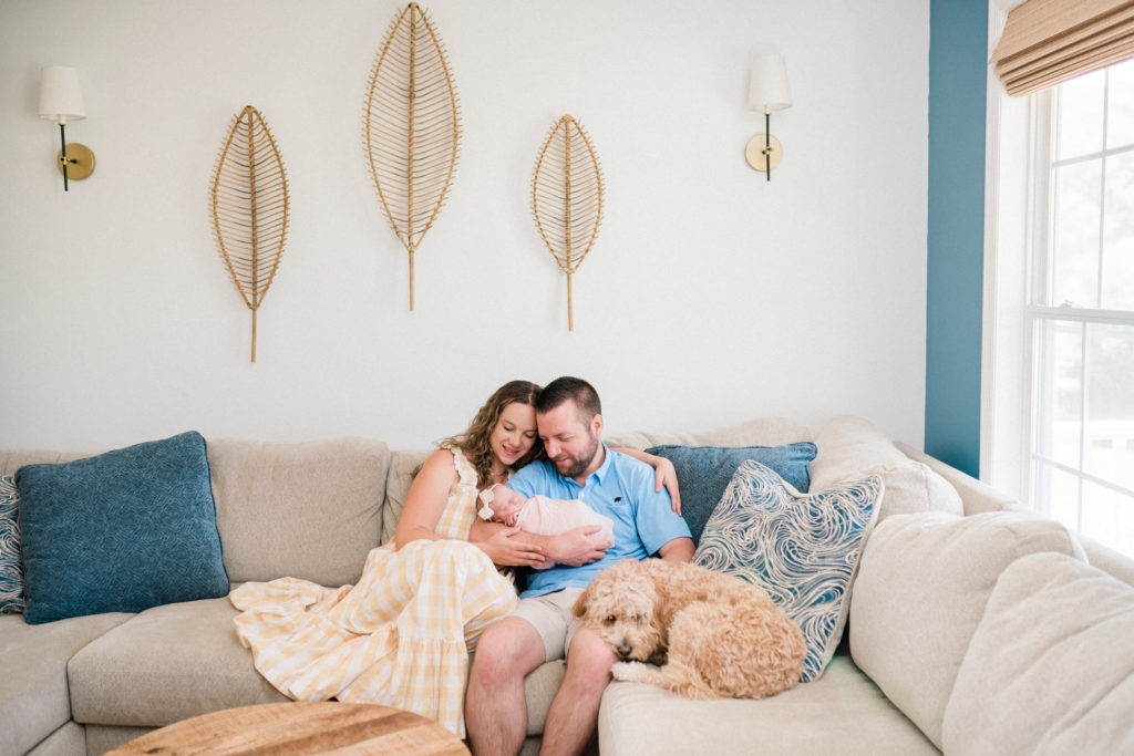 in home baby photoshoot with the family dog. New Jersey Newborn photographer. | Renee Ash Photography