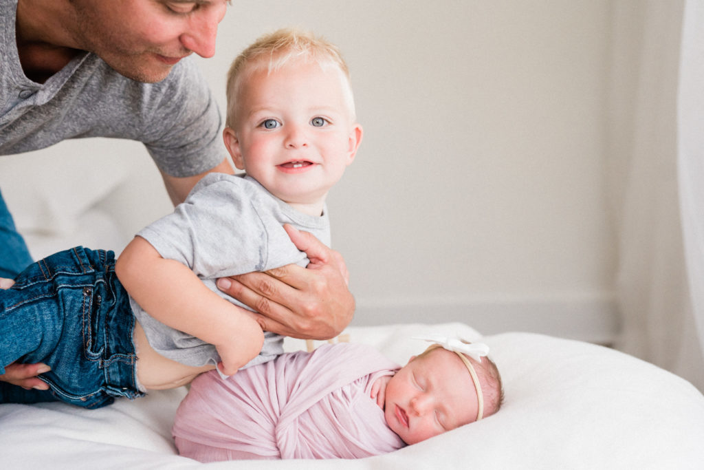 at home newborn photoshoot with a big brother. New Jersey Newborn photographer. | Renee Ash Photography