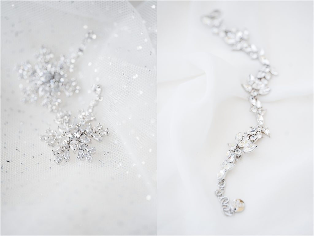 Bride's wedding day jewelry detail photos. Snowflake earrings and a diamond bracelet. New Jersey wedding photographer. 