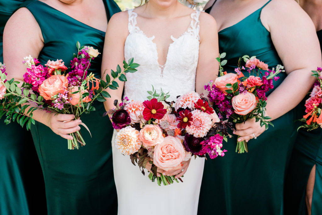 Grand Cascades Ballroom Summer wedding. bright color floral on trend bouquets by Whisper and Brook Florist. 