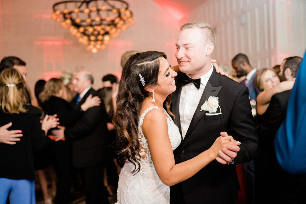 Ryland Inn Wedding. Bride and groom dancing in the Coach house reception area. New Jersey Wedding Photographer