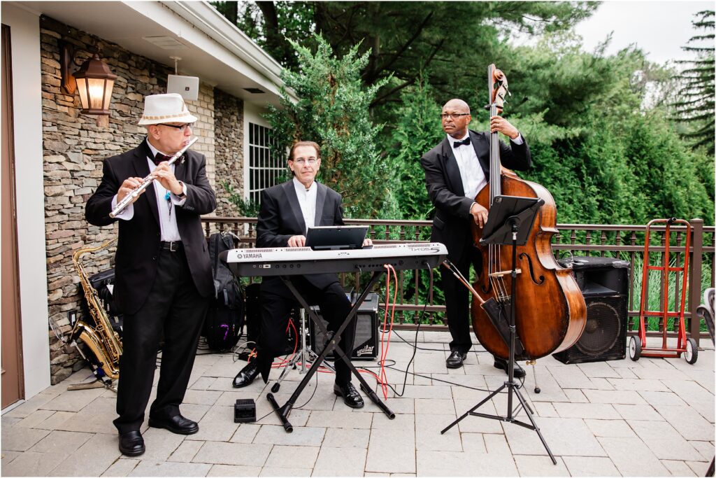 three piece band at the Sherwood chalet at Forest Lodge wedding venue. Renee Ash Photography, NJ wedding photographer