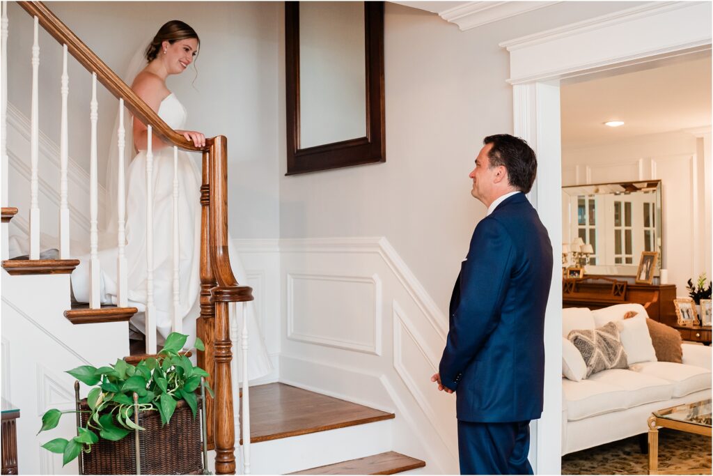  Father daughter first look by a staircase.  Passaic county wedding photographer.