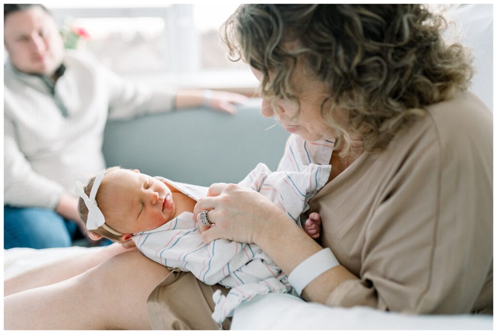 Mother bonding with newborn baby within 48 hours of birth in hospital