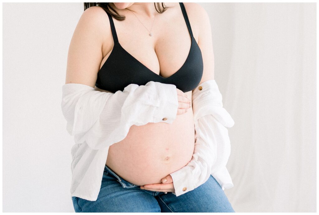 Modern Boudoir style maternity session in sparta NJ. bright, minimal neutral, black bra and white button down shirt