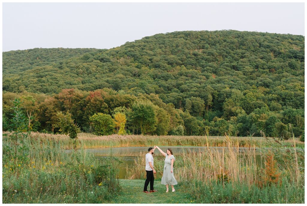 Wantage NJ Engagement Photos in Sussex County featuring a nature preserve session with two outfits, champagne toasts, and a Waterloo Village wedding.