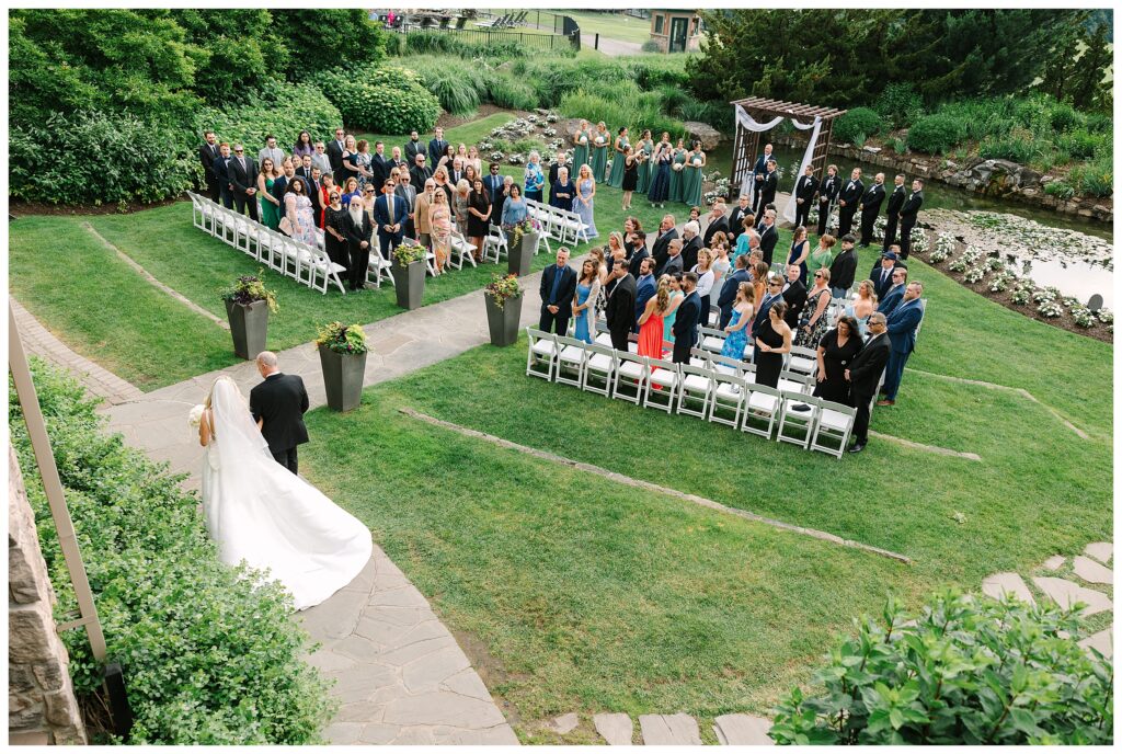 An elegant Crystal Springs Wedding at grand cascades lodge NJ. Garden ceremony, Emerald Ballroom reception, and golden hour portraits