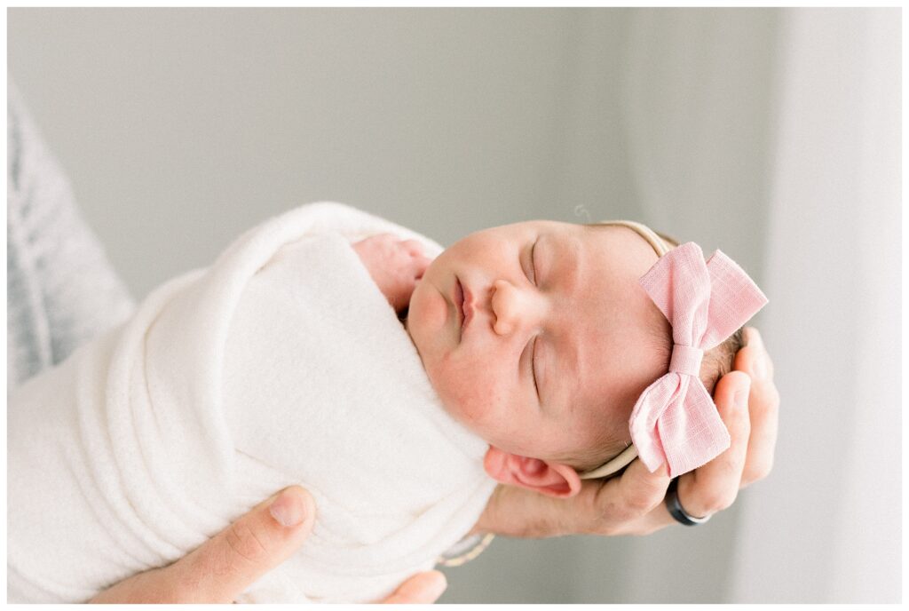Newborn Photography in North NJ photography in north new jersey with renee Ash Photography. light and minimal using neutral wraps, soft textures, and clean backdrops, then added the sweetest subtle pops of pink and red as a nod to Valentine’s Day. It was just enough color to feel seasonal and fun, while still keeping the images classic and timeless.