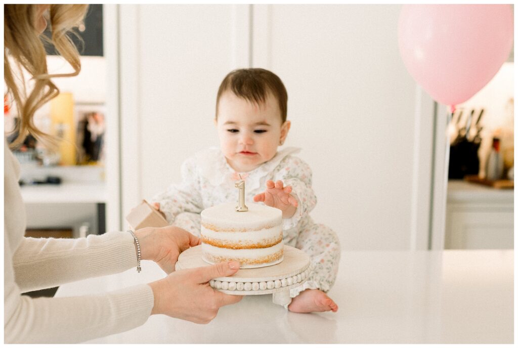 Cozy kitchen cake smash photo from North Jersey in-home birthday pictures