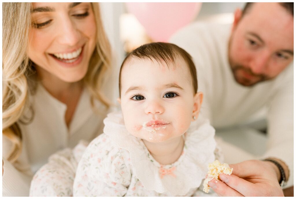 In-home cake smash on kitchen island during first birthday session in Madison NJ