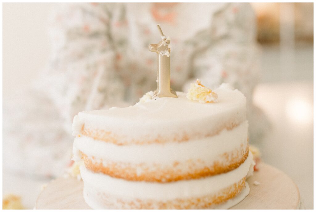 In-home cake smash on kitchen island during first birthday session in Madison NJ