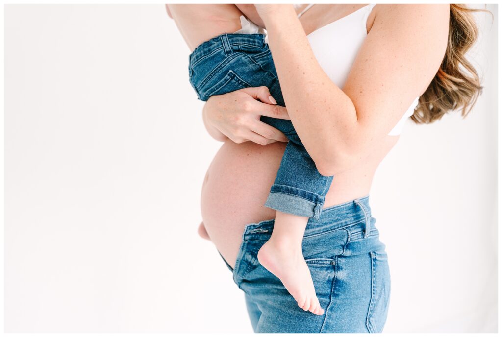 studio maternity session in Sussex County New Jersey with relaxed modern styling and a big sibling toddler 