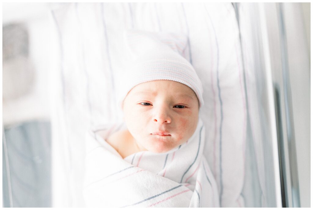 Baby boy just 24 hours old in the hospital after delivery at Morristown Medical Center during baby's first photo shoot with Fresh 48 Newborn Photographer renee Ash Photography