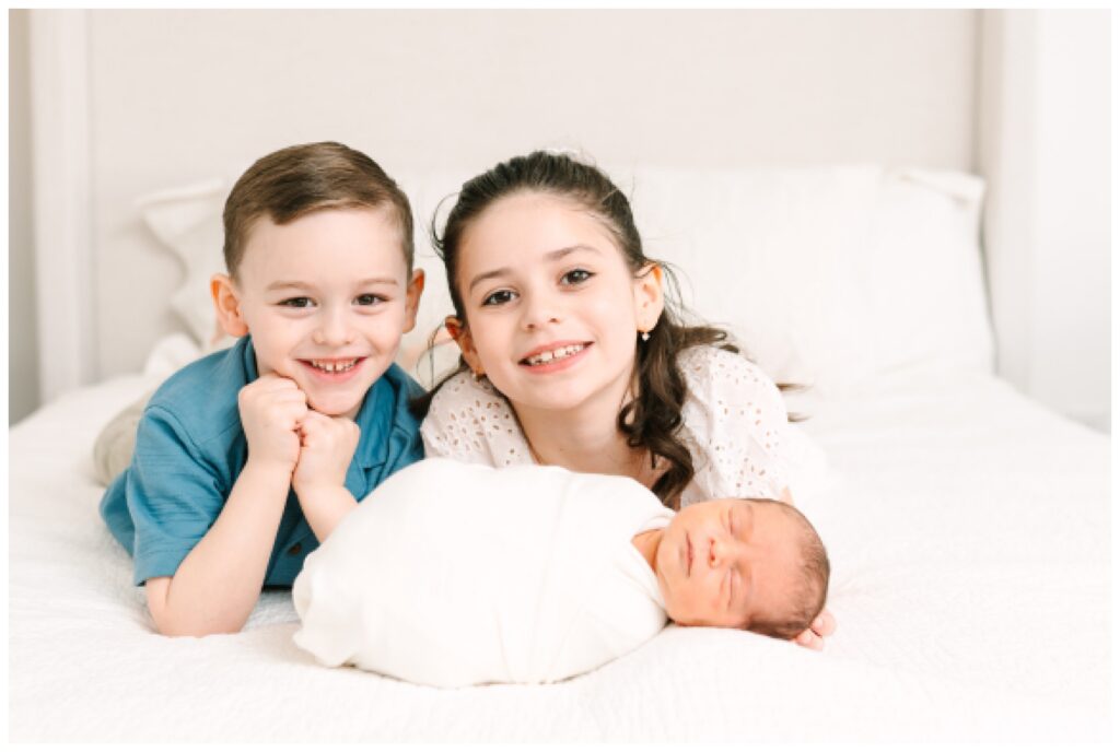 Mother and children photographer for mothers day in north new jersey Newborn Photography in North New Jersey | Natural Family Studio Session with Siblings white and blue wardrobe minimal simple styling