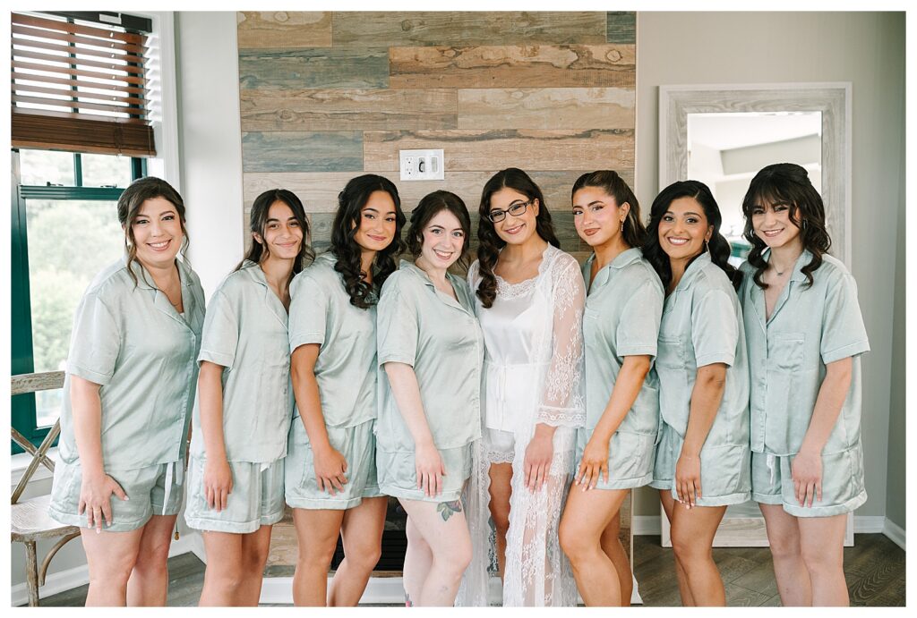 bridesmaids and bride in getting ready silk pajamas in a minty green color :  Wedding at Mountain Creek Resort Venue Photographer renee Ash Photography