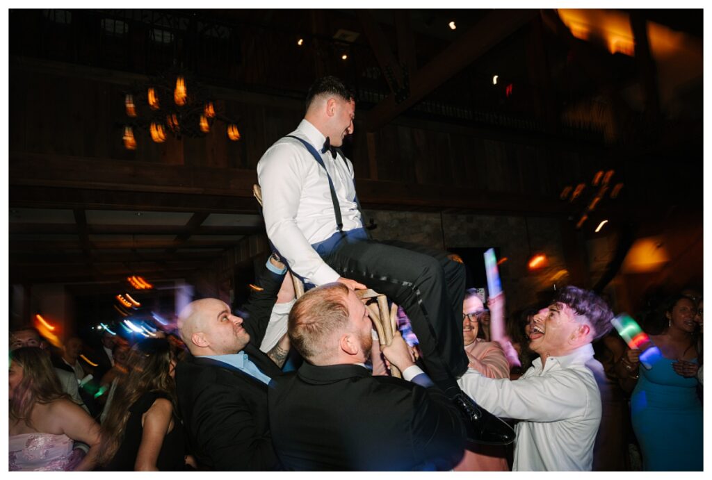 Fun Modern Flash photography party photos during dancing at the Elevated Rustic Mountain Lodge Wedding Reception Space at Mountain Creek Resort Venue Photographer Renee Ash Photography