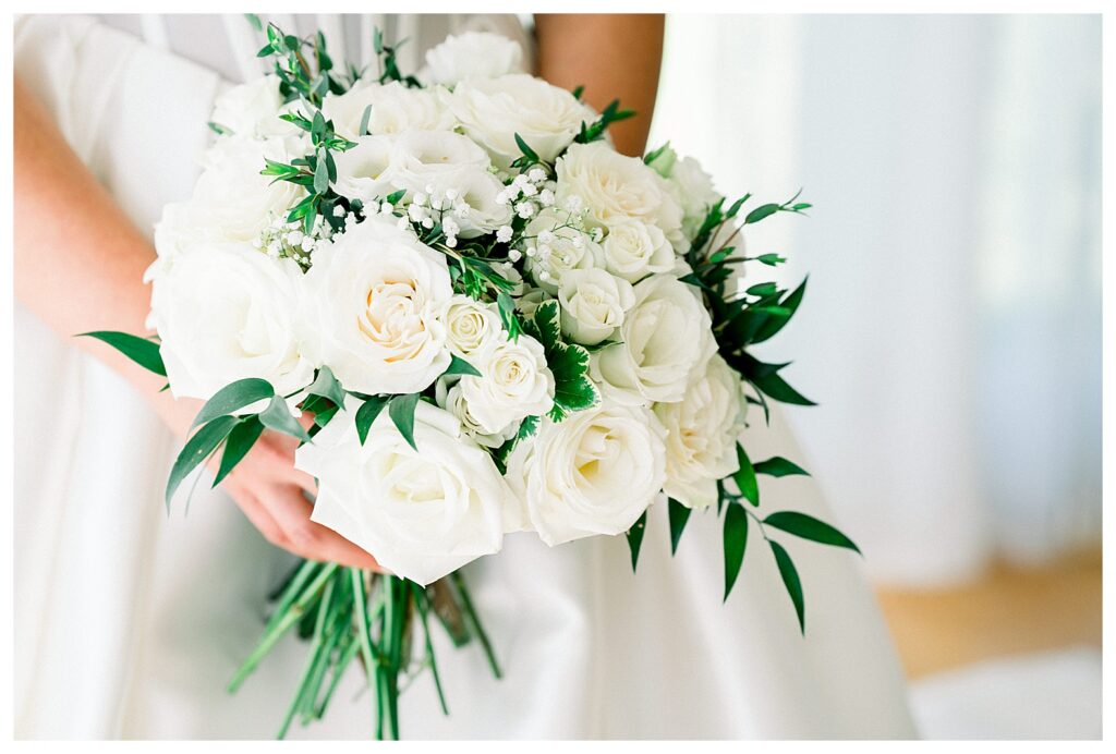 bride's bouquet of roses and greenery bride getting ready to walk down the aisle. portraits in the getting ready space by catskills ny wedding photographer: Stonewall Estate Catskills NY | Mountain-View Wedding Weekend